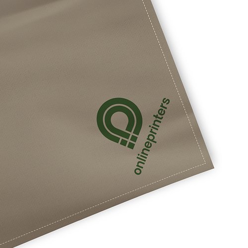 Beige Picknickdecke aus Stoff mit gesteppten Rndern.